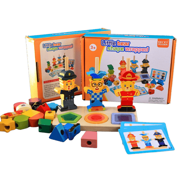 Toddler stacking colourful wooden shape pieces on bear stacker toy