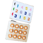 Child playing with wooden memory matching game tiles