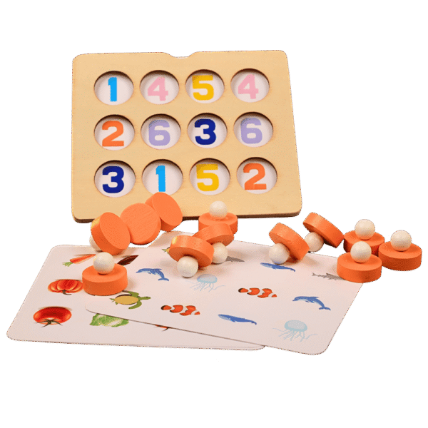 Child playing with wooden memory matching game tiles
