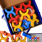 X shaped wooden blocks arranged for play