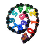 Magnetic small wooden train toy on floor for toddlers