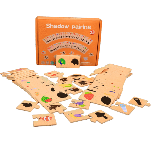 Shadow pairing puzzle cards arranged on table for kids learning