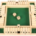 Wooden Shut The Box game board with dice ready to play